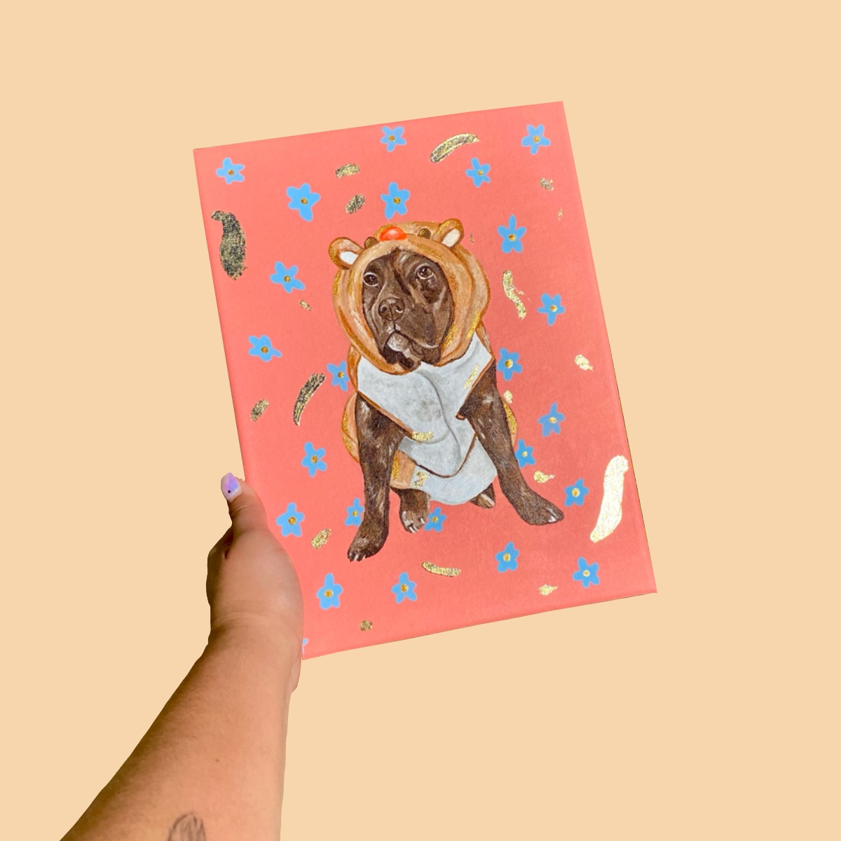 Custom painted bulldog portrait on a coral canvas with blue flowers.