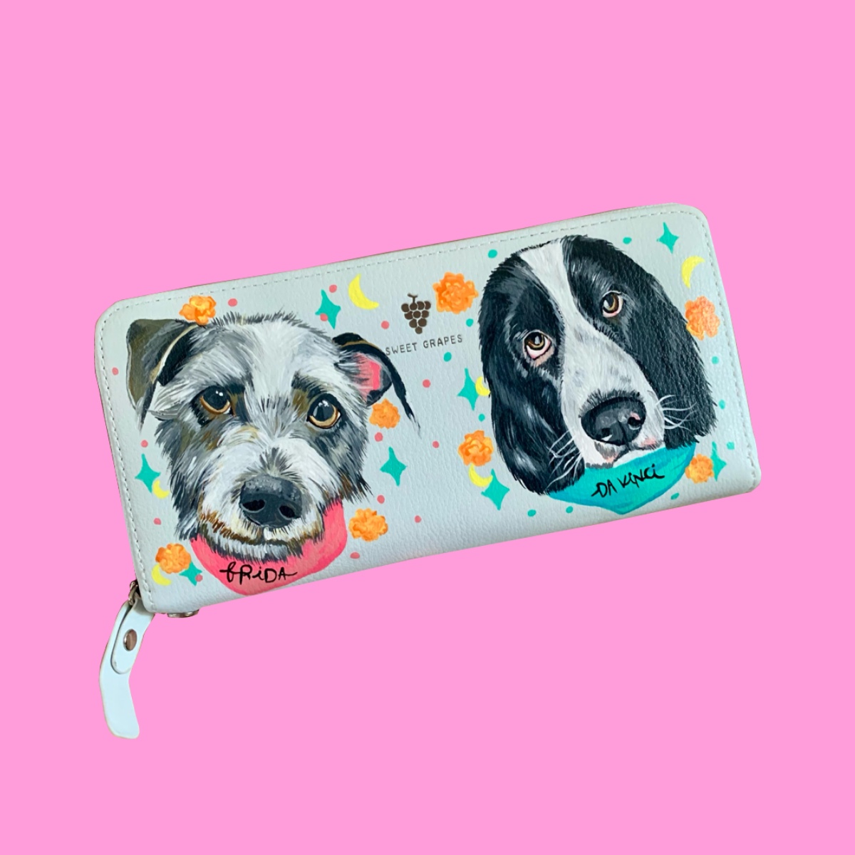 Mint wallet hand-painted with two custom dog portraits and small flowers.